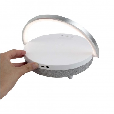 Logotrade Logogeschenke das Foto: Prixton 10W 4-in-1 Bluetooth®-Lautsprecher mit LED-Licht und kabelloser Ladestation