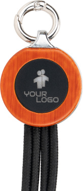 Logotrade Logogeschenke das Foto: 4-in-1-Kabel mit elighted-Logo im Holzgehäuse