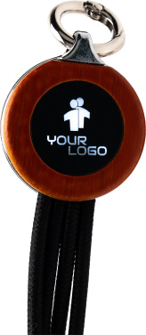 Logotrade Werbegeschenke das Foto: 4-in-1-Kabel mit elighted-Logo im Holzgehäuse