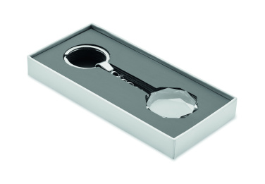 Logotrade reklamprodukter bild: Rund nyckelring i glas